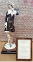 Picture of GIUSEPPE ARMANI 196/C NELLIE (LADY WITH UMBRELLA) PORCELAIN FIGURINE