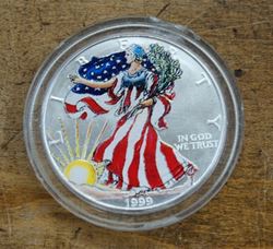 Picture of 1999 1 oz. fine silver...one dollar painted silver eagle  mint 