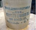 Picture of VINTAGE STONE WEAR VINTAGE  JUG. "THIS JUG IS NOT SOLD..THE.. THE PEOPLE'S LIQUOR CO. 126 SENECA ST BUFFALO.- N.Y COLLECTIBLE". GOOD CONDITION. 