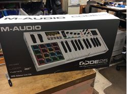 Picture of M-audio mixing board midi control code 25 new . In box .