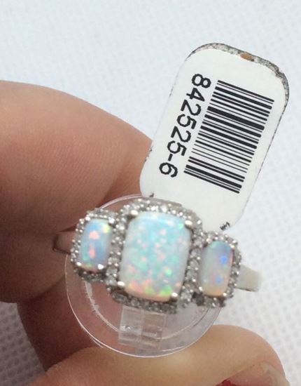 Picture of 14kt white gold fashion ring with 0.25 carat of 40 round diamonds and 3 beautiful opals. Size 9.5 . 3.3 gr . 842525-6. 