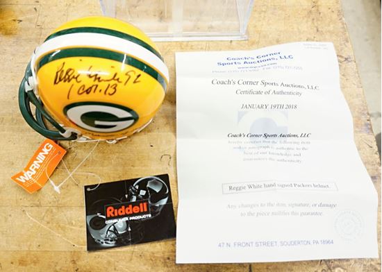 Picture of REGGIE WHITE HAND SIGNED PACKET MINI HELMET RIDDELL MINT COLLECTIBLE. WITH COA. 