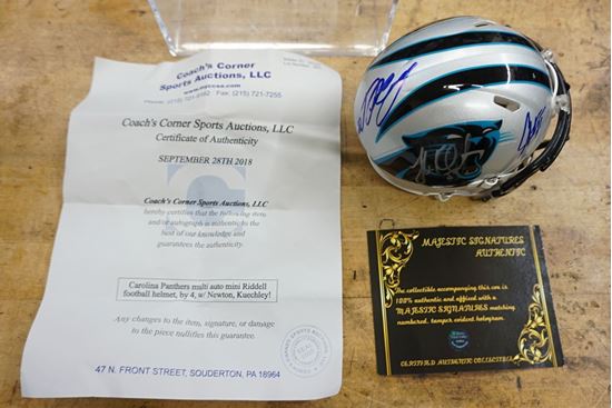 Picture of CAROLINA PANTHERS MULTI AUTO MINI HELMET BY 4 NEWTON KUECHLEY RIDDELL WITH COA; PLASTIC CASE. MINT CONDITION. COLLECTIBLE