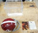 Picture of BART STAR SIGNED MINI HELMET WITH COA RIDDELL MINT CONDITION. COLLECTIBLE. WITH PLASTIC CASE AND COA . COA # GV307634. 