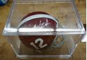 Picture of BART STAR SIGNED MINI HELMET WITH COA RIDDELL MINT CONDITION. COLLECTIBLE. WITH PLASTIC CASE AND COA . COA # GV307634. 