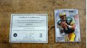 Picture of BRETT FAVRE SIGNED MINI HELMET WITH CASE; COA; AND FOOTBALL CARD MINT COLLECTIBLE. 