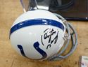 Picture of PEYTON MANNING AUTOGRAPHED MINI HELMET AND SIGNED FOOTBALL CARD; COA; CASE. MINT CONDITION. COLLECTIBLE.
