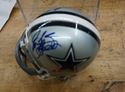 Picture of MINI HELMET SIGNED BY 3; TROY AIKMAN 8 ; EMMITT SMITH 22; 3RD SIGNATURE UNKNOWN DALLAS COWBOYS WITH COA. MINT CONDITION. COLLECTIBLE. RIDDELL MINI HELMET 