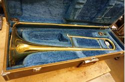 Picture of Vintage Yamaha Trombone YSL-352 with mouthpiece , case.  PLEASE READ CAREFULLY. BEING SOLD AS IS. AS FIXER UPPER.  INSTRUMENT HAS DENTS. 