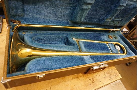 Picture of Vintage Yamaha Trombone YSL-352 with mouthpiece , case.  PLEASE READ CAREFULLY. BEING SOLD AS IS. AS FIXER UPPER.  INSTRUMENT HAS DENTS. 