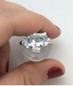 Picture of 14kt white gold ring size 7.25 with 4 small diamonds and 3 light blue oval stones 2.7 gr 803093-1 