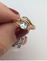 Picture of 10kt yellow gold ring with oval clear blue stone 2.0gr size 7 pre owned mint 821852-1 