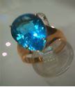 Picture of 14kt yellow gold fashion ring with pear shape light blue topaz stone total weight 5.8 gr . Pre owned . Size 8.25 