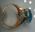 Picture of 14kt yellow gold fashion ring with pear shape light blue topaz stone total weight 5.8 gr . Pre owned . Size 8.25 