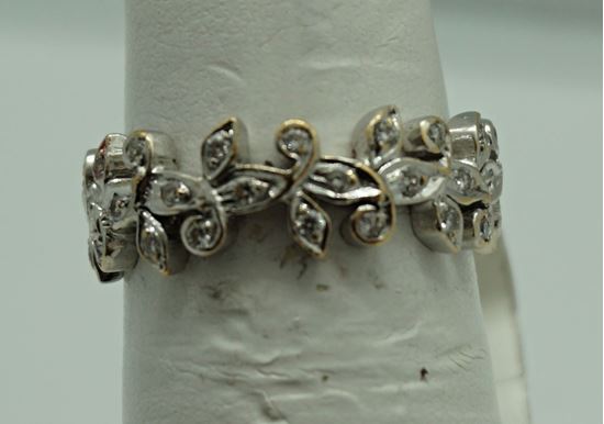 Picture of 14kt white gold eternity  band with diamonds 4.2 gr size 6 with 48 diamonds approximately 0.50 carat . Pre owned. 829384-2. This is not sizable.