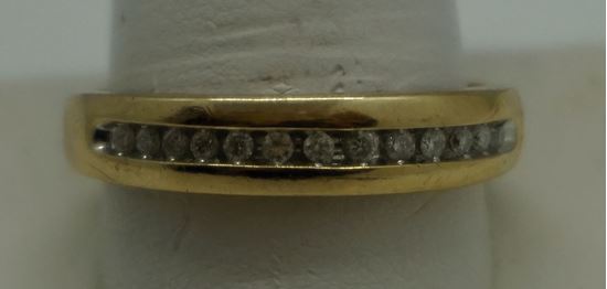 Picture of 1O KT YELLOW GOLD  WEDDING BAND WITH 13 ROUND DIAMONDS 0.25PTS  3.0GR GOOD CONDITION. PRE OWNED. 843206-1 