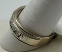 Picture of 14KT WHITE GOLD BAND WITH 8 ROUND DIAMONDS (1 CARAT) SIZE 12 8.6 GR GOOD CONDITION. PRE OWNED. 838998-1.