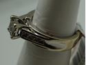 Picture of 14KT WHITE GOLD 7.1GR WITH 12 PRINCESS CUT DIAMONDS 0.75PTS SIZE 6 GOOD CONDITION. PRE OWNED. 827030-1.