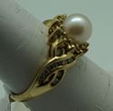 Picture of 14KT YELLOW GOLD RING SIZE 7 W ROUND DIAMONDS 0.50PTS AND 7MM PEARL 4.3GR. PRE OWNED. VERY GOOD CONDITION. 851001-2.