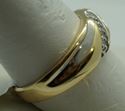 Picture of 14kt yellow gold ring size 10 with 8 diamonds 0.10 total diamond weight . Total weight 4gr. Pre owned. 846228-1 
