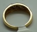 Picture of 14kt yellow gold ring size 10 with 8 diamonds 0.10 total diamond weight . Total weight 4gr. Pre owned. 846228-1 