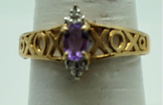 Picture of 10kt yellow gold ring with oval amethyst and 2 small round diamonds . Size 7 . Pre owned. very good. Total weight 2.2  . 824461-4.
