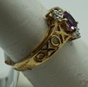 Picture of 10kt yellow gold ring with oval amethyst and 2 small round diamonds . Size 7 . Pre owned. very good. Total weight 2.2  . 824461-4.