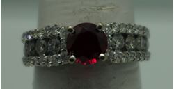 Picture of 14kt white gold ring with diamonds and red stone size 6.75