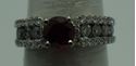 Picture of 14kt white gold ring with diamonds and red stone size 6.75