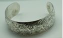 Picture of S KIRK AND SON FLOWER ENGRAVED BANGLE STERLING SILVER CUFF BRACELET .38.4 GRAM. VERY GOOD CONDITION. PRE OWNED. 852279. 