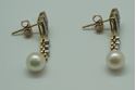 Picture of 14KT YELLOW GOLD DROP PEARL (2 PEARLS 6.75MM EACH) EARRINGS  ( 1 INCH LONG ) 3.4GR WITH 30 ROUND DIAMONDS 0.33PTS. GOOD CONDITION. 851617-1.