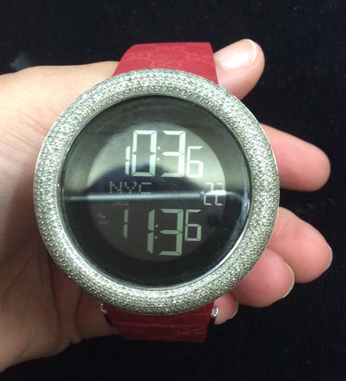 Picture of Stainless steel Gucci watch with red robber band and 4kt pave diamond bezel ( approximately) Pre owned very good condition 850764-1 