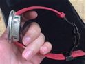 Picture of Stainless steel Gucci watch with red robber band and 4kt pave diamond bezel ( approximately) Pre owned very good condition 850764-1 