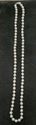 Picture of 26 INCH LONG  PEARL PEACH COLOR (7MM)  NECKLACE WITH 14KT WHITE GOLD CLASP VERY GOOD CONDITION. WITH CASE.