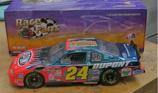 Picture of 1/24 JEFF GORDON #24 DUPONT HALF CLEAR CAR 2001 ACTION NASCAR . NEW . IN BOX.