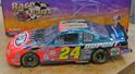 Picture of 1/24 JEFF GORDON #24 DUPONT HALF CLEAR CAR 2001 ACTION NASCAR . NEW . IN BOX.