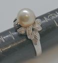 Picture of 18KT WHITE GOLD RING WITH 9MM PEARL AND 0.25 CARAT DIAMONDS (28 ROUND);  5.3 GR; SIZE 7 VERY GOOD CONDITION. PRE OWNED.  852076-2.