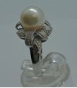 Picture of 18KT WHITE GOLD RING WITH 9MM PEARL AND 0.25 CARAT DIAMONDS (28 ROUND);  5.3 GR; SIZE 7 VERY GOOD CONDITION. PRE OWNED.  852076-2.