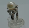 Picture of 18KT WHITE GOLD RING WITH 9MM PEARL AND 0.25 CARAT DIAMONDS (28 ROUND);  5.3 GR; SIZE 7 VERY GOOD CONDITION. PRE OWNED.  852076-2.
