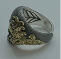 Picture of DAVID YURMAN LARGE SKULL STERLING SILVER RING WITH 18KT WAVES DESIGN SIZE 10.  31.2 GRAMS. PRE OWNED. VERY GOOD CONDITION. 852263-1. 