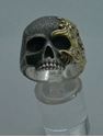 Picture of DAVID YURMAN LARGE SKULL STERLING SILVER RING WITH 18KT WAVES DESIGN SIZE 10.  31.2 GRAMS. PRE OWNED. VERY GOOD CONDITION. 852263-1. 