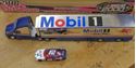 Picture of 1:64 MOBIL ONE RACING TRUCK & SMALL FORD TAURUS CAR COLLECTIBLE NEW. IN BOX.