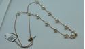 Picture of 14KT ROSE GOLD THIN ROPE WITH 6MM PEARLS 24 INCHES LONG 6.4GR 821779-8 