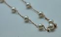 Picture of 14KT ROSE GOLD THIN ROPE WITH 6MM PEARLS 24 INCHES LONG 6.4GR 821779-8 