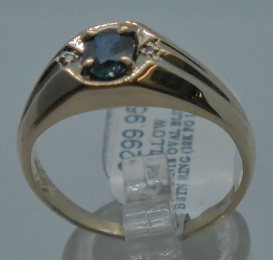 Picture of 10kt yellow gold ring 4.4 gram with blue oval stone size 10.5 pre-owned. very good condition.