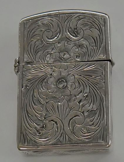 Picture of VINTAGE STERLING SILVER 800 FILIGREE  ZIPPO LIGHTER ZIPPOMFG.CO. BRADRORD PA PAT 2032695 MADE IN USA.  BEING SOLD AS IS . LIGHTER NEEDS A FLINT. 