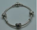 Picture of PANDORA BRACELET WITH 3 CHARMS 22 GRAMS PRE OWNED 849511-1