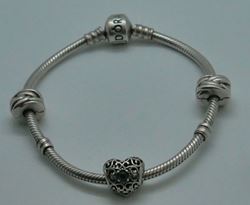 Picture of PANDORA BRACELET WITH 3 CHARMS 22 GRAMS PRE OWNED 849511-1