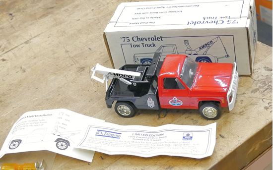 Picture of AMOCO 1975 CHEVROLET TOW TRUCK NUMBER  IN A SERIES COIN BANK CAR WITH COA BOX.