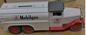 Picture of Vintage Ertl Oil Company Mobil Gas Truck 1930 coin bank car with keys new . in box. box have some wear due to its age. car is in perfect condition. never been used. collectible .